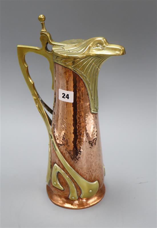 A German Jugendstil copper and brass ewer height 38cm